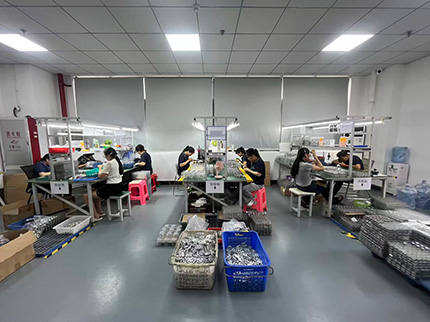 Staff inspecting CNC products